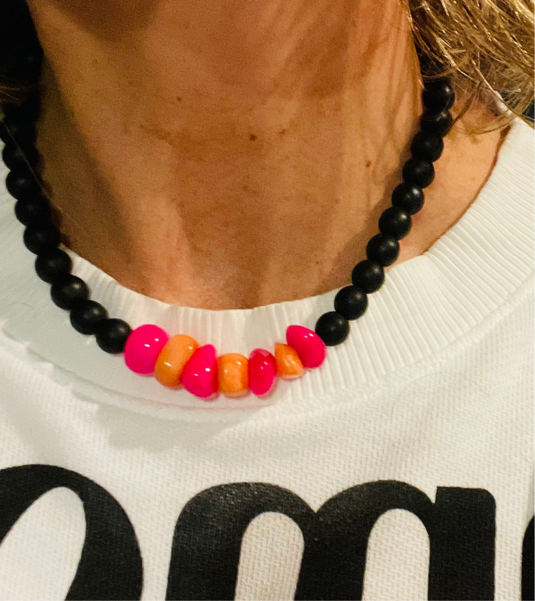 Ana naranjo fucsia